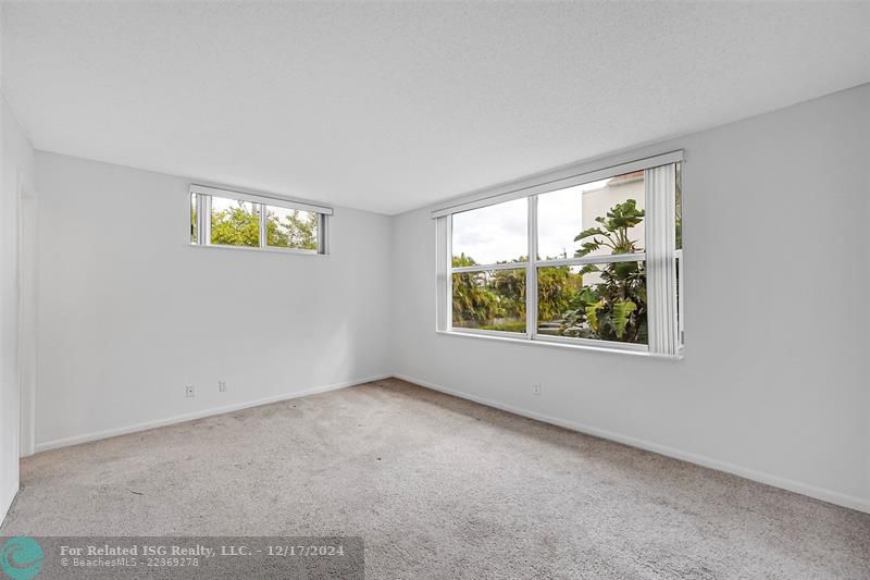 Virtually staged - cabinets are beige.