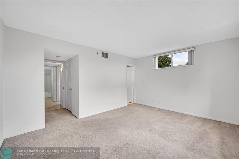 Virtually staged - cabinets are beige.