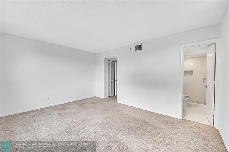 Virtually staged - cabinets are beige.