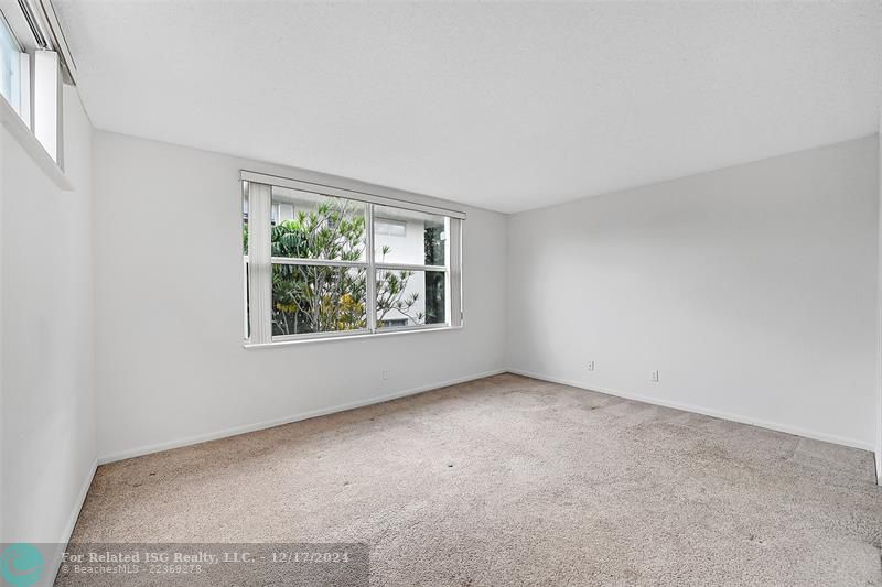 Virtually staged - cabinets are beige.