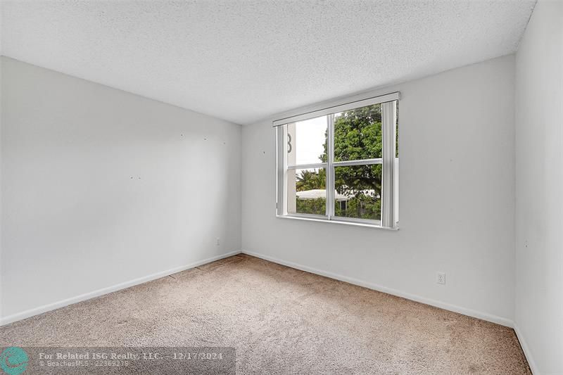 Virtually staged - cabinets are beige.