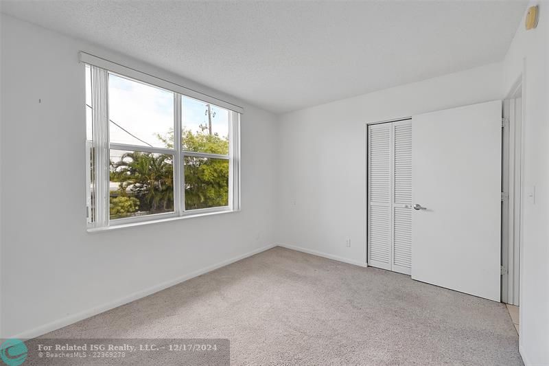 Virtually staged - cabinets are beige.