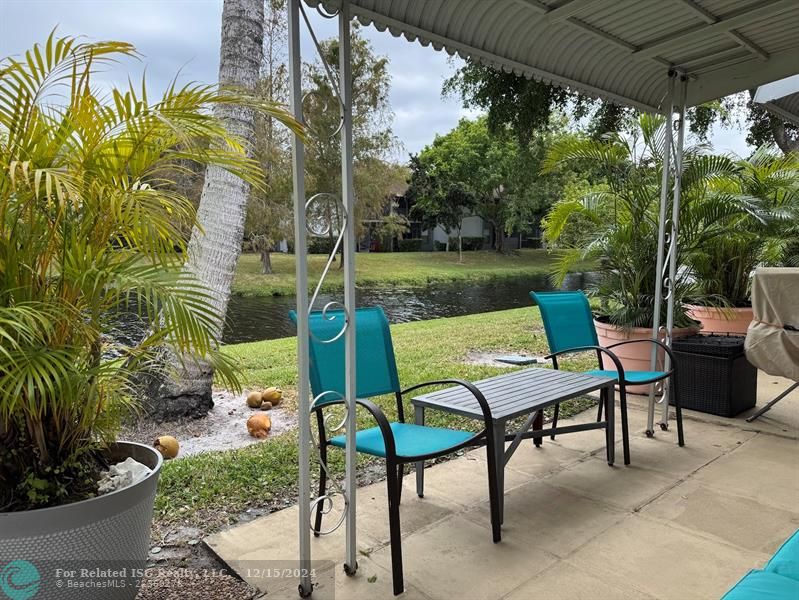 REAR PATIO OVERLOOKING WATER