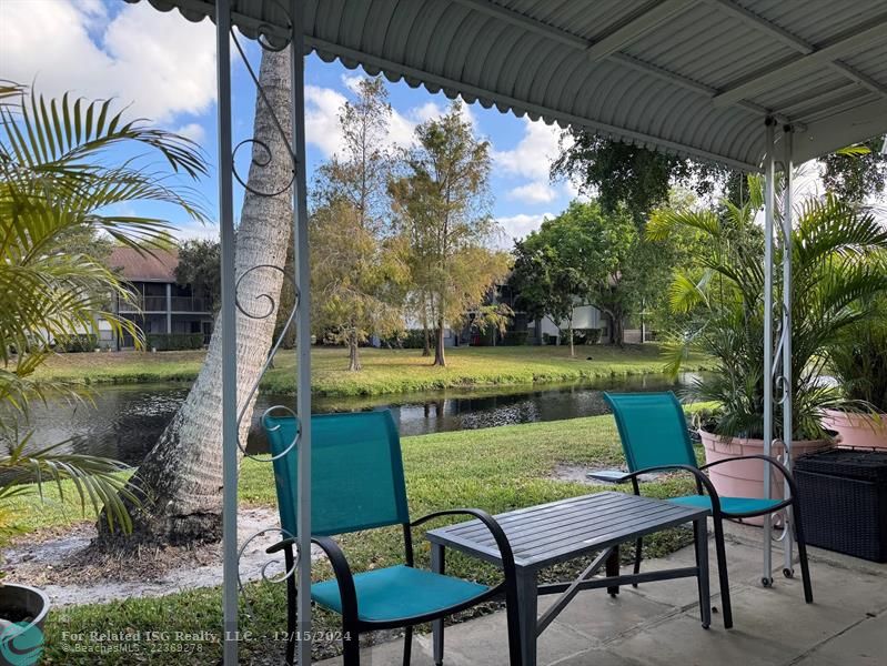 REAR PATIO OVERLOOKING WATER