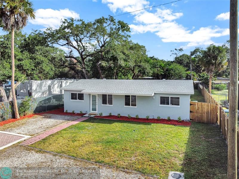 This true Florida home has a split plan. There is two- bedrooms, one bath on the North side, and two-bedroom, one bathroom on the south side. The oversided lot is is perfect if you need more living space.