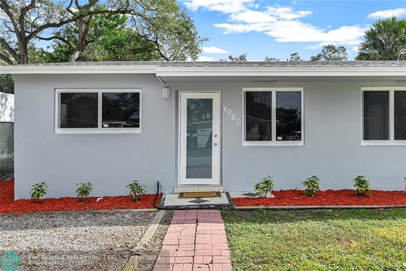 This true Florida home has a split plan. There is two- bedrooms, one bath on the North side, and two-bedroom, one bathroom on the south side. The oversided lot is is perfect if you need more living space.