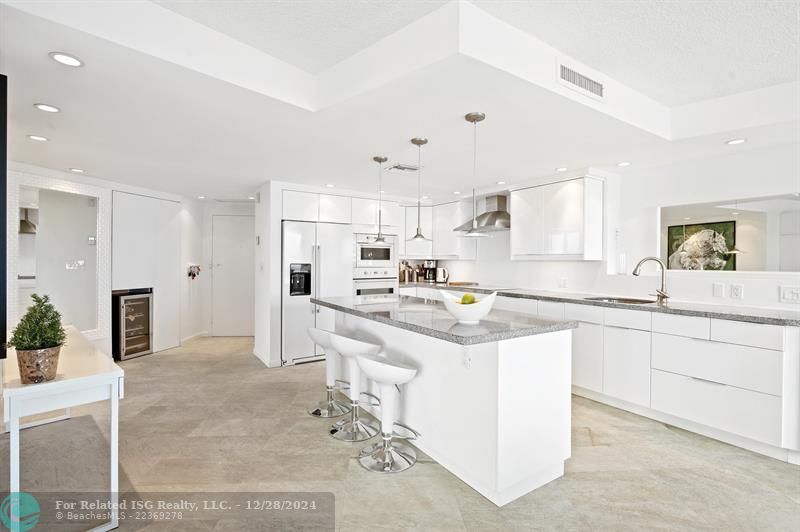 Open Kitchen with Counter Seating Area