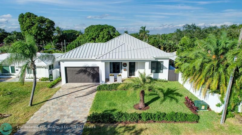 Experience modern luxury living in this new construction home, perfectly situated in Fort Lauderdaleâ€™s vibrant Poinsettia Heights!