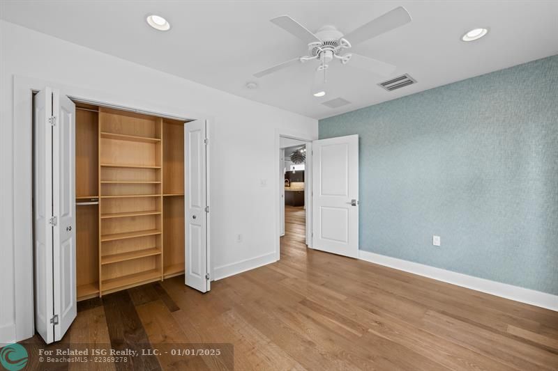 3rd Bedroom with textured Anthropology Wallpaper