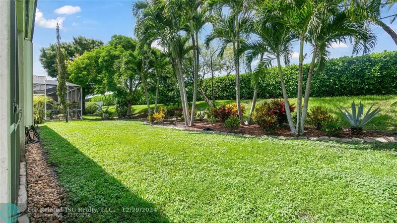 Private back yard with magnificent landscaping