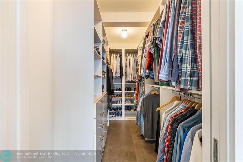 Expansive Primary Bedroom Walk-In Custom Closet