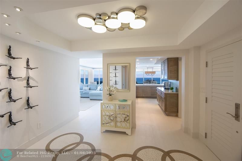 FOYER ENTRY LOOKING TO KITCHEN & LIVING ROOM