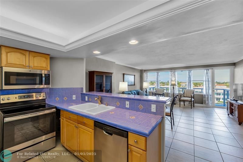 Open Kitchen to Dining and Living Room - Counter Bar