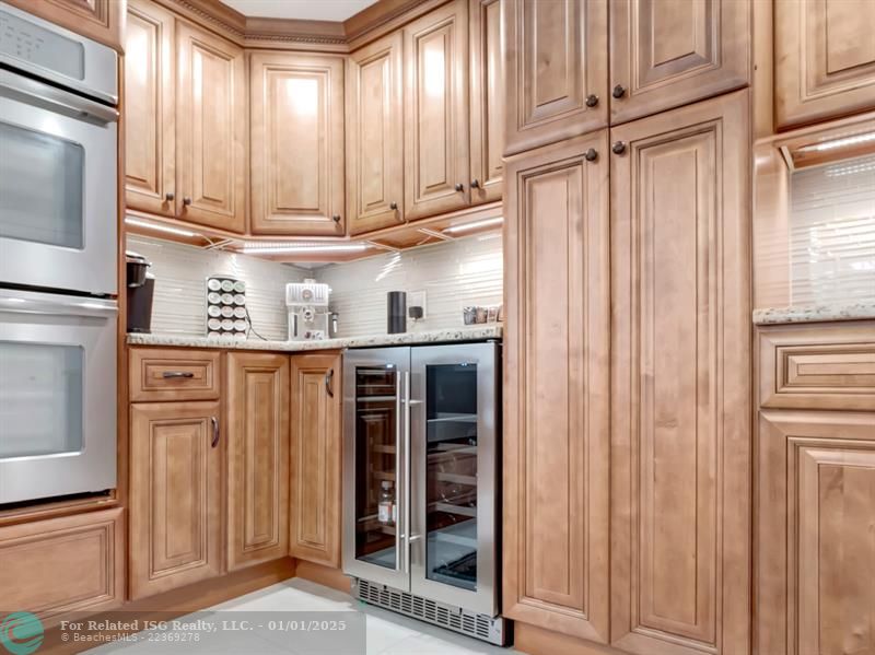 two pantries, wine cooler, double oven