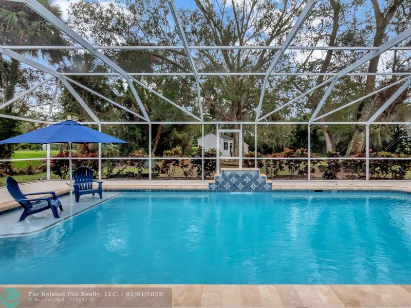 lovely private pool fountain and sun screen area