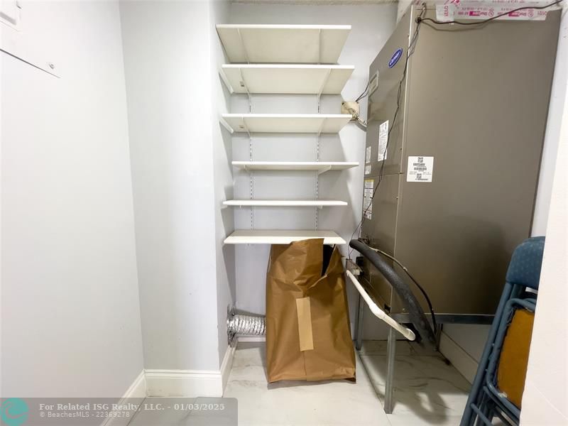 Hallway closet with plenty of storage space