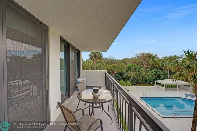 West Facing Balcony w/ Pool View