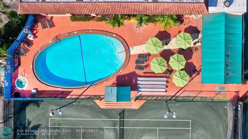 Tennis Racquet shaped Heated Pool & Hot Tub.