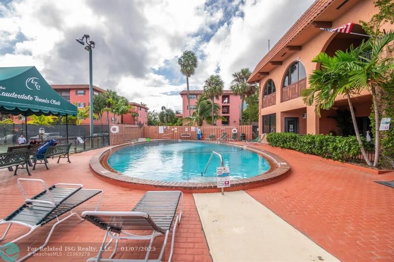 Heated 'Tennis Racquet 'shaped Pool from the Patio Bar