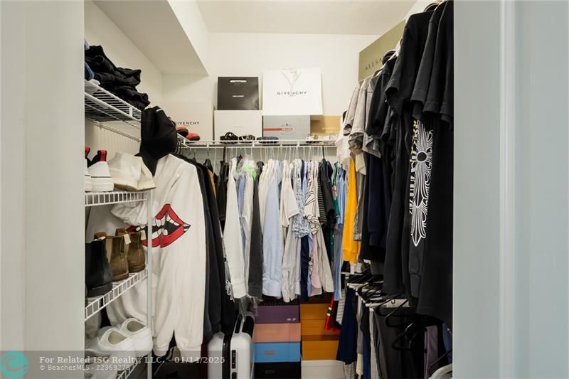 Primary Bedroom walk-in closet