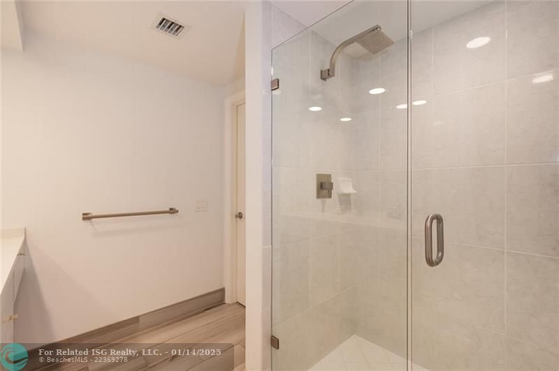 Primary Bath with glass-enclosed separate shower