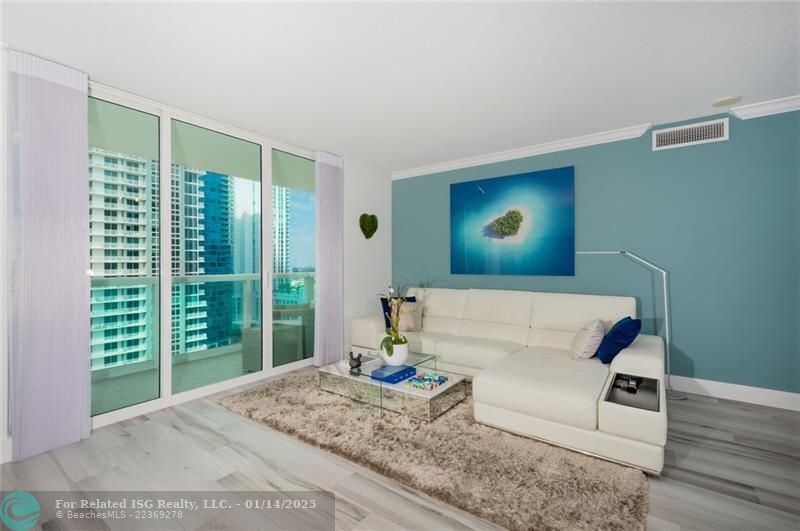 Living Room with access to the sliding doors/glass terrace