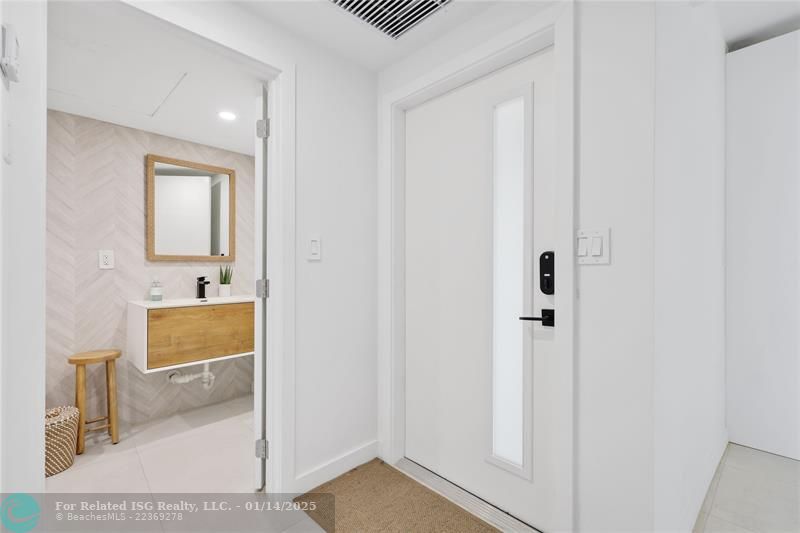 Entry foyer and 2nd full/guest bathroom